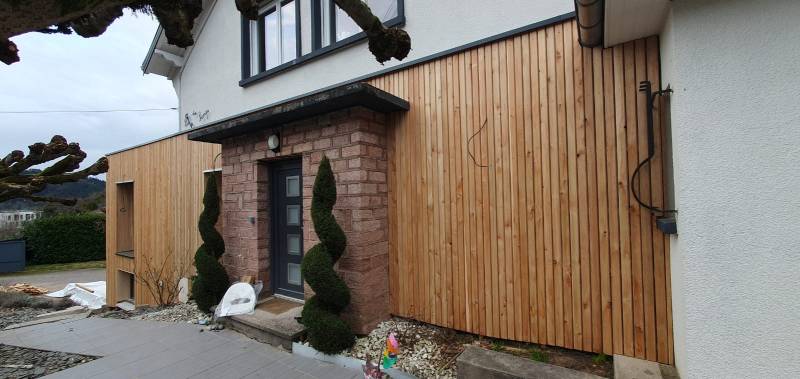 Réalisation d'un bardage bois en mélèze dans les Vosges